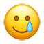 Smilende ansigt med tåre-emoji U+1F972